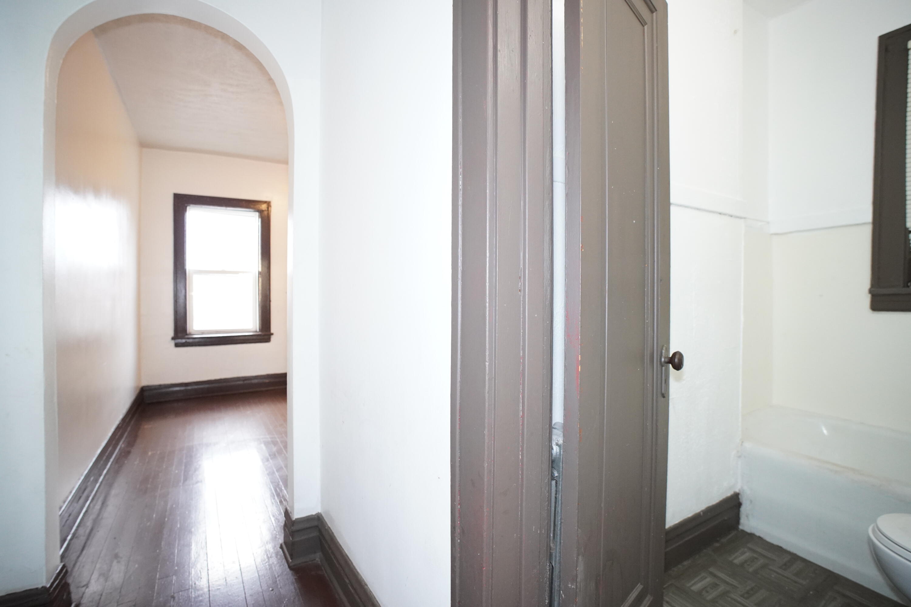 130 East 13th Avenue, Unit 8 Gary, IN 46407 - Photo 9 of 17 a view of a room that has a window in it