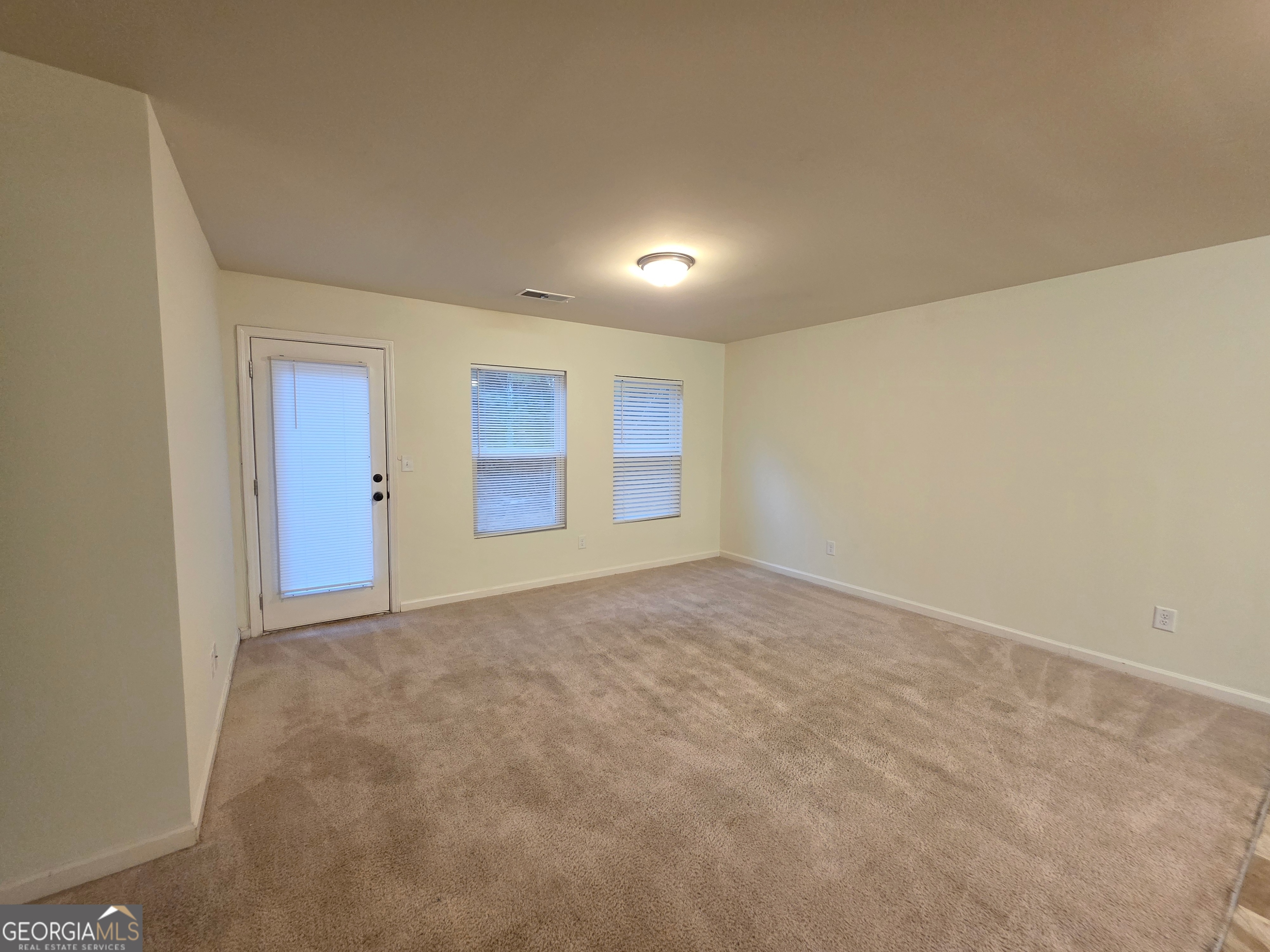 115 Wynne Street Macon, GA 31206 - Photo 2 of 8 a view of an empty room