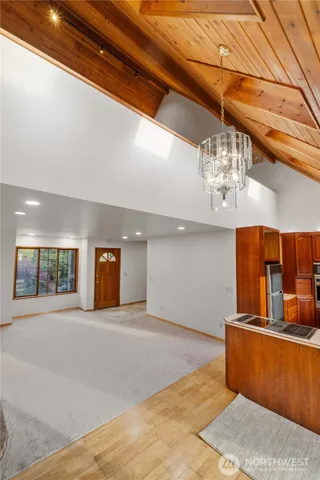a view of storage and utility room with washer and dryer