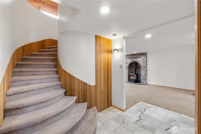a view of entryway with wooden floor