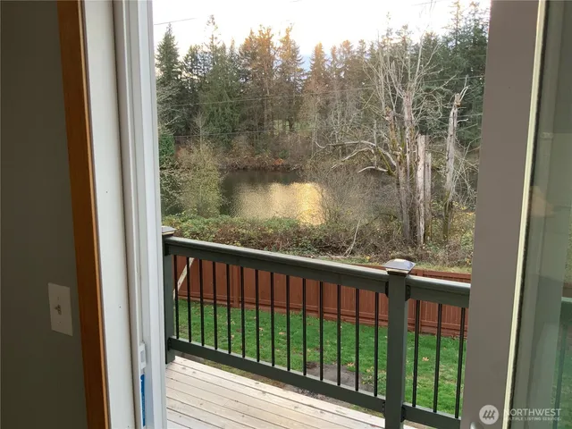 a kitchen with stainless steel appliances granite countertop a refrigerator stove and sink