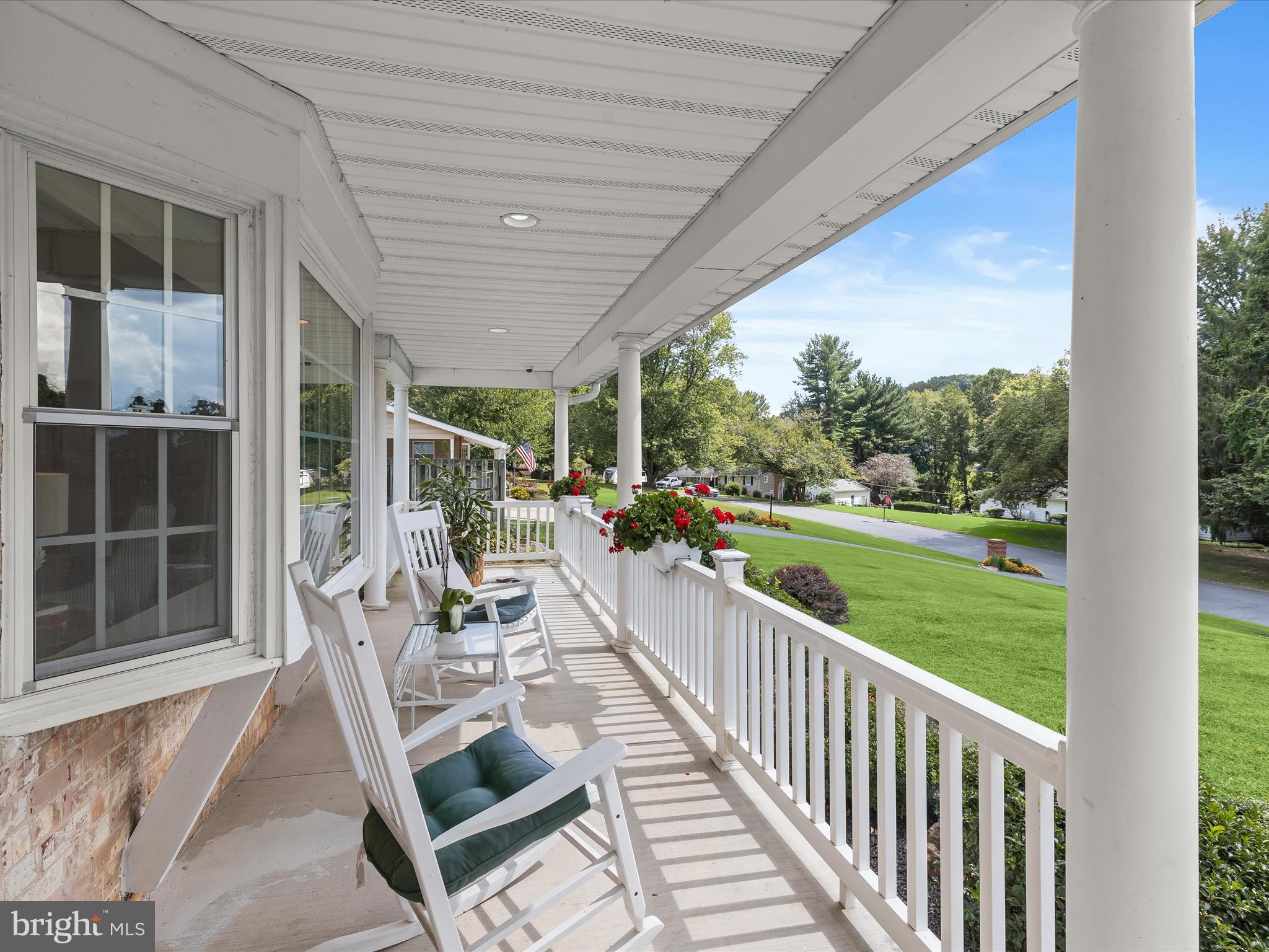 2123 Round Hill Road Fallston, MD 21047 - Photo 2 of 46 a view of a porch with chairs and backyard