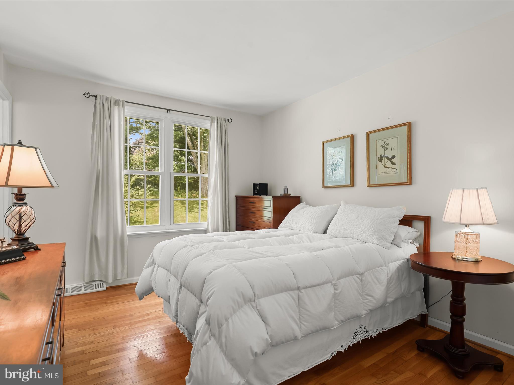 2123 Round Hill Road Fallston, MD 21047 - Photo 26 of 46 a bedroom with a bed and wooden floor