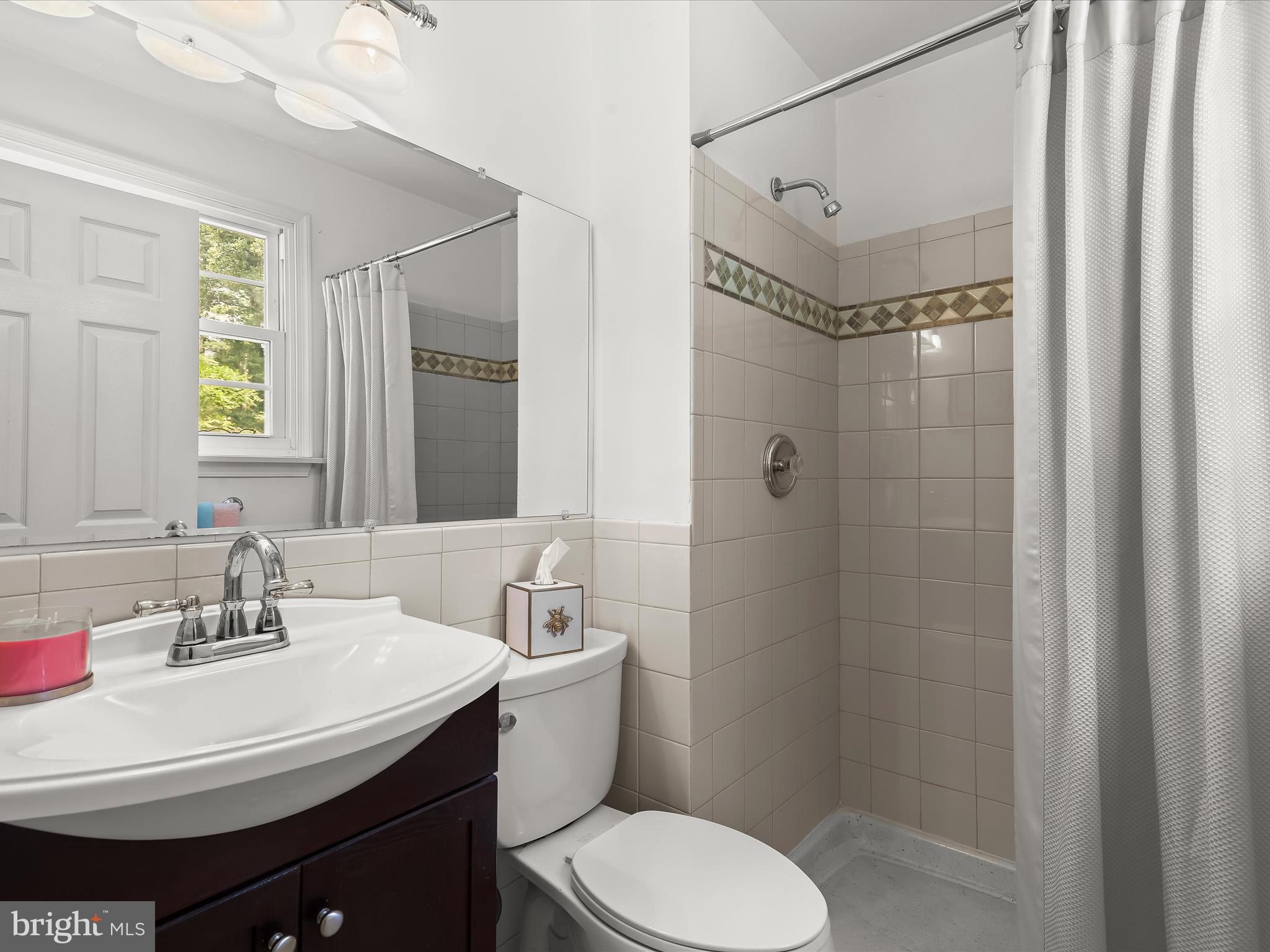 2123 Round Hill Road Fallston, MD 21047 - Photo 27 of 46 a bathroom with a sink toilet and shower