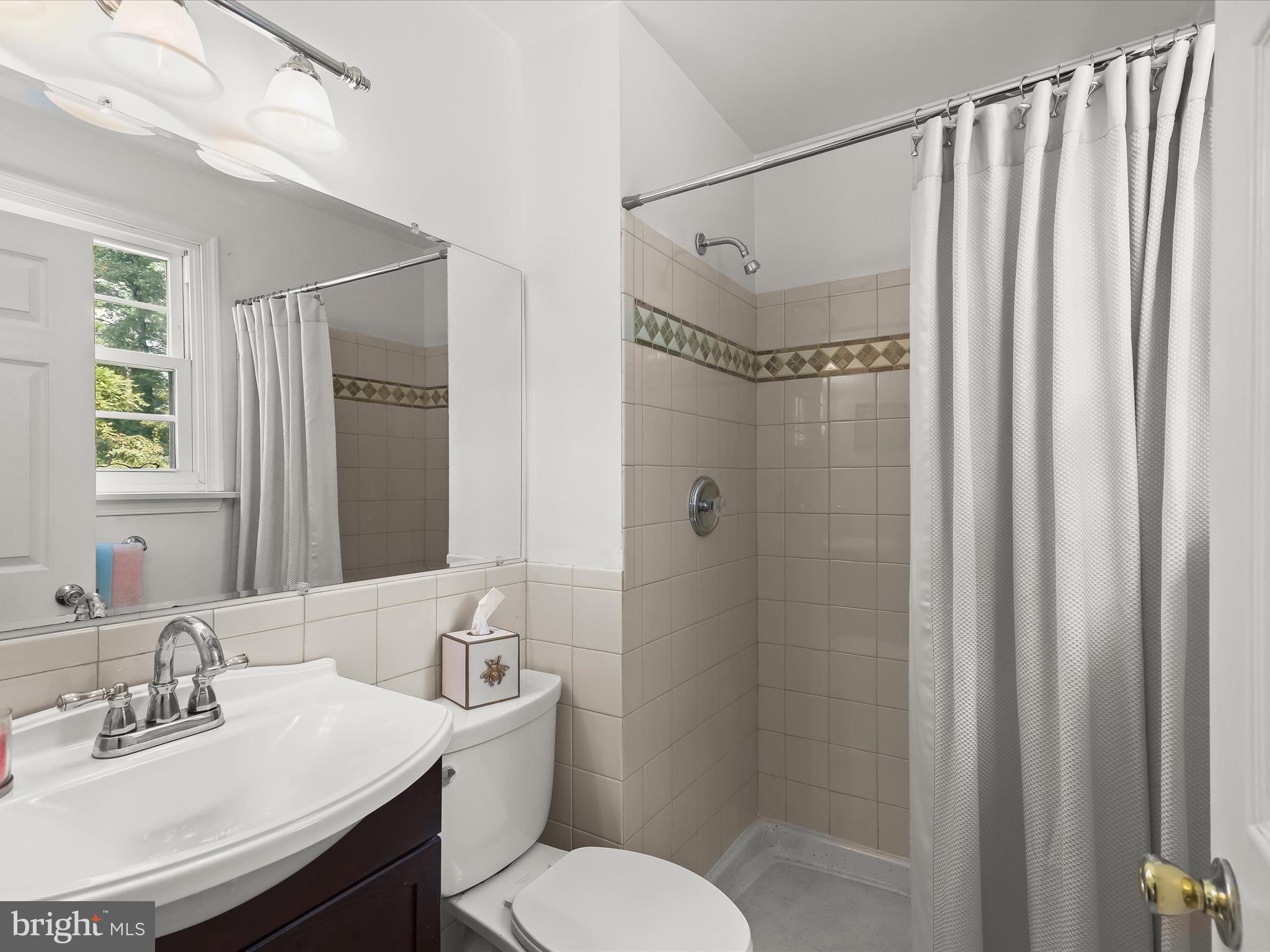 2123 Round Hill Road Fallston, MD 21047 - Photo 28 of 46 a bathroom with a sink toilet and shower