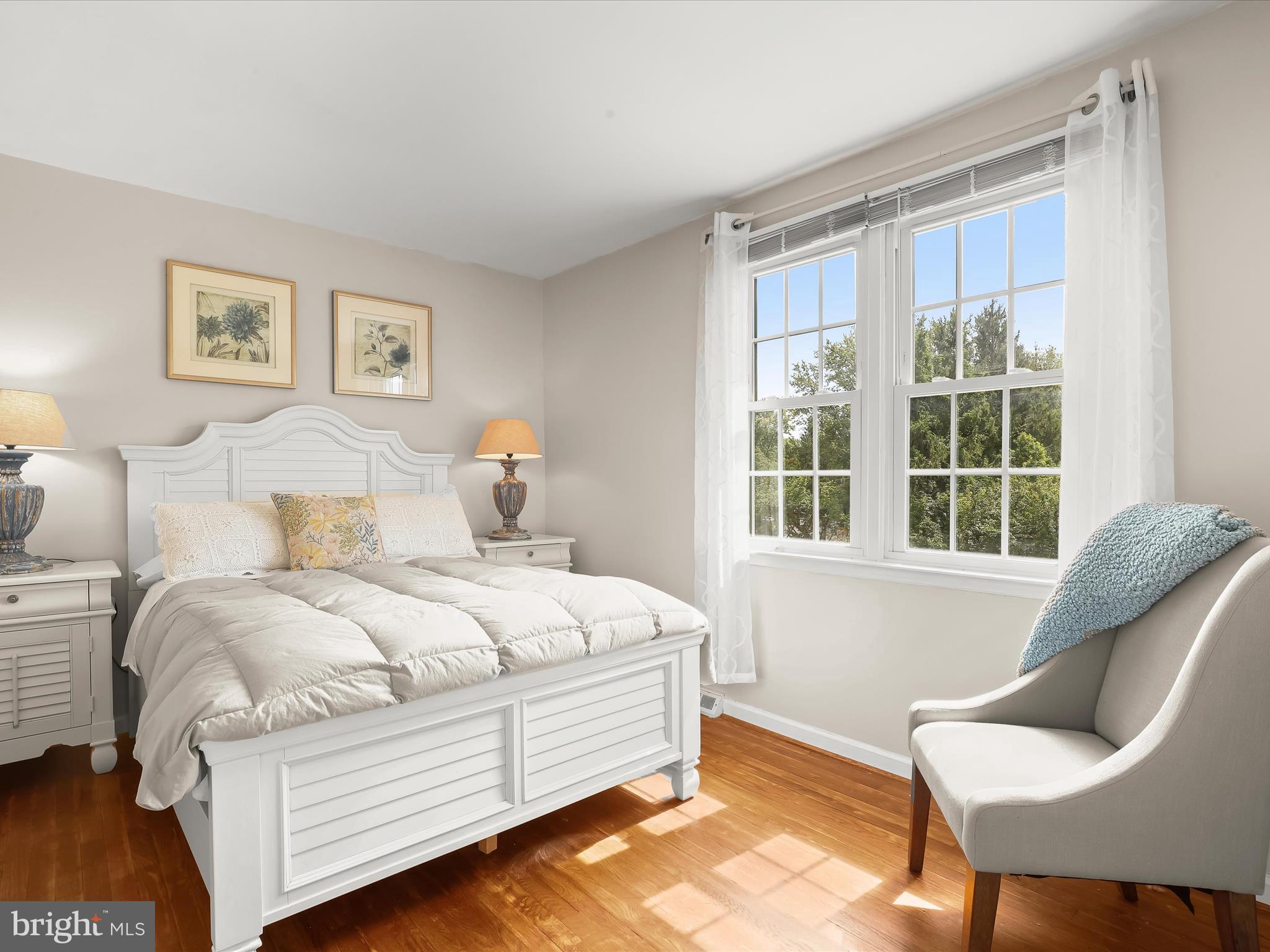 2123 Round Hill Road Fallston, MD 21047 - Photo 30 of 46 a spacious bedroom with a bed and chair