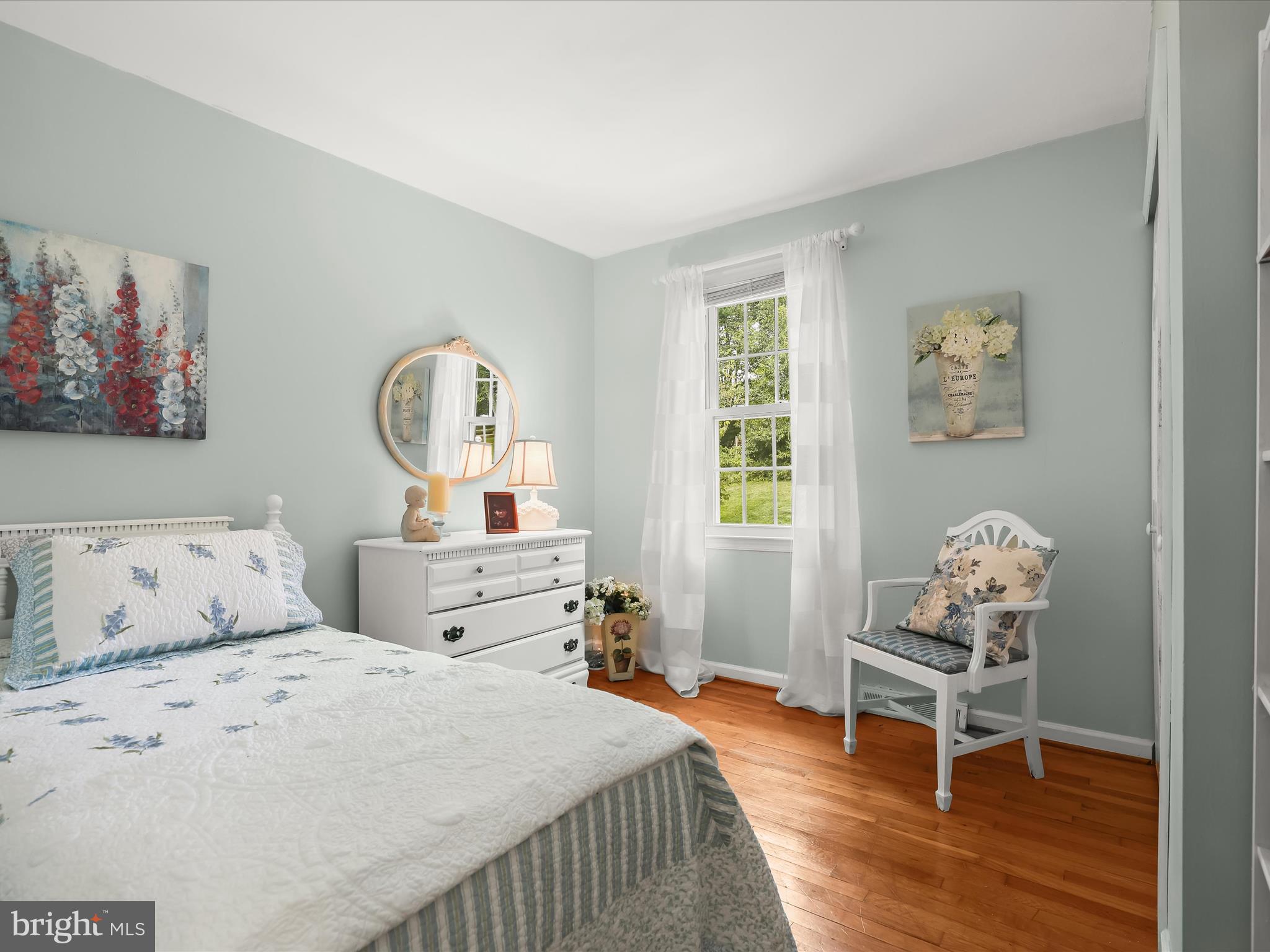 2123 Round Hill Road Fallston, MD 21047 - Photo 34 of 46 a bedroom with a bed and wooden floor