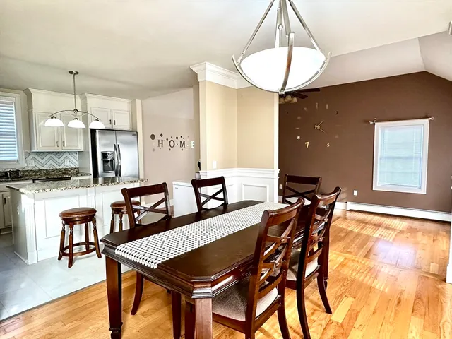 a view of a dining room with furniture