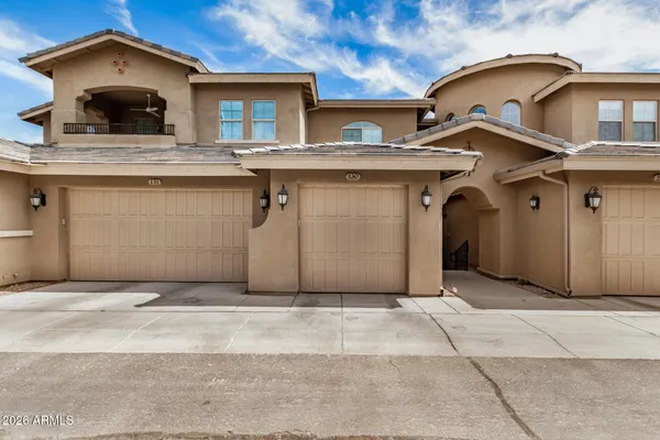 a view of a house with a garage