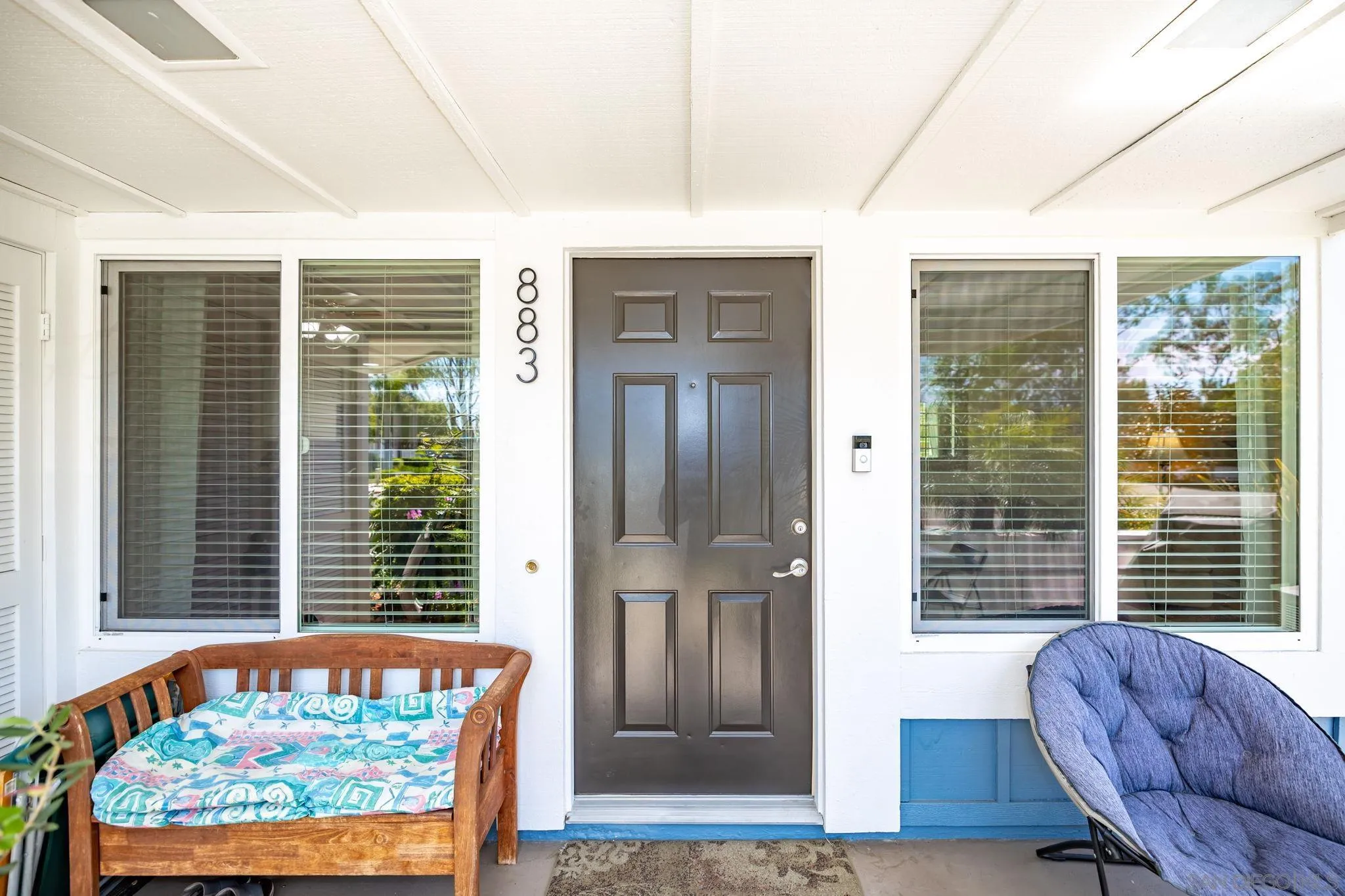 883 Ginger Avenue Carlsbad, CA 92011 - Photo 1 of 33 a front view of a house with balcony