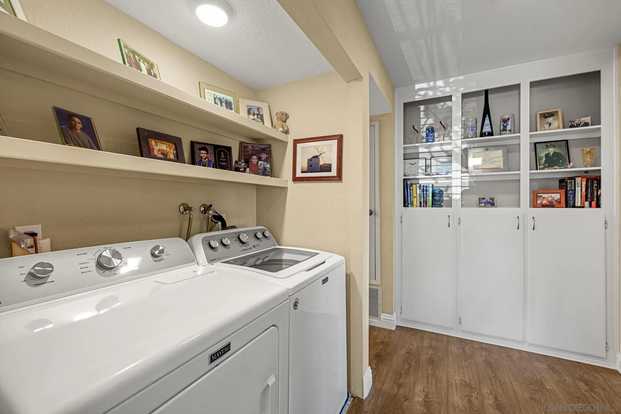 883 Ginger Avenue Carlsbad, CA 92011 - Photo 21 of 33 a utility room with dryer and washer