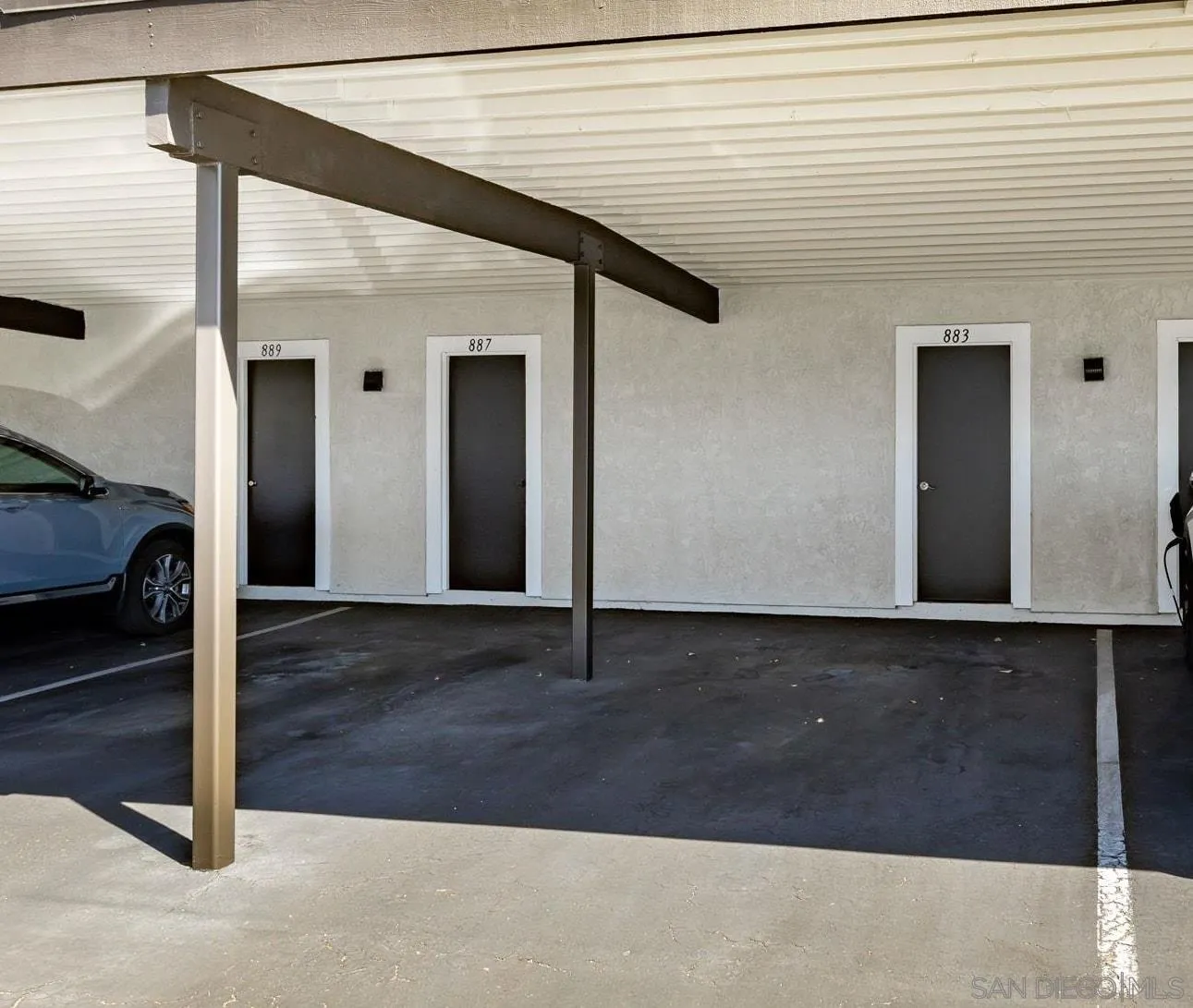 883 Ginger Avenue Carlsbad, CA 92011 - Photo 22 of 33 a front view of a house with a garage