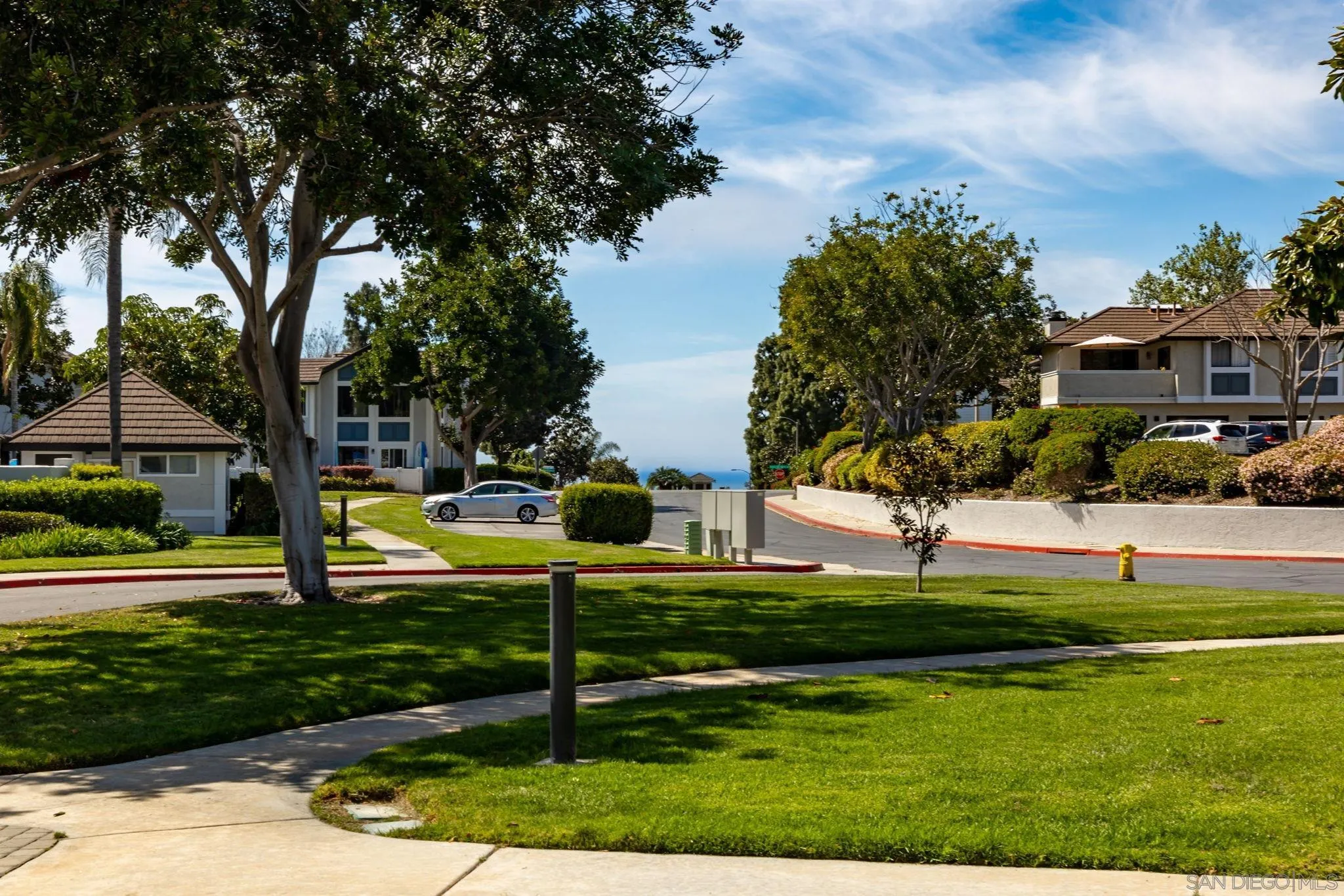 883 Ginger Avenue Carlsbad, CA 92011 - Photo 24 of 33 a view of a house with big yard