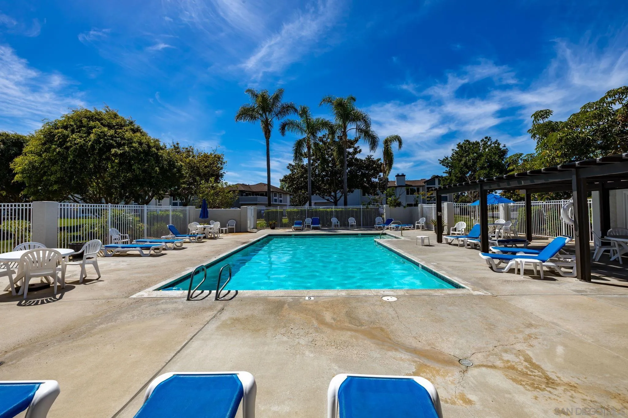 883 Ginger Avenue Carlsbad, CA 92011 - Photo 28 of 33 a view of a swimming pool with a patio