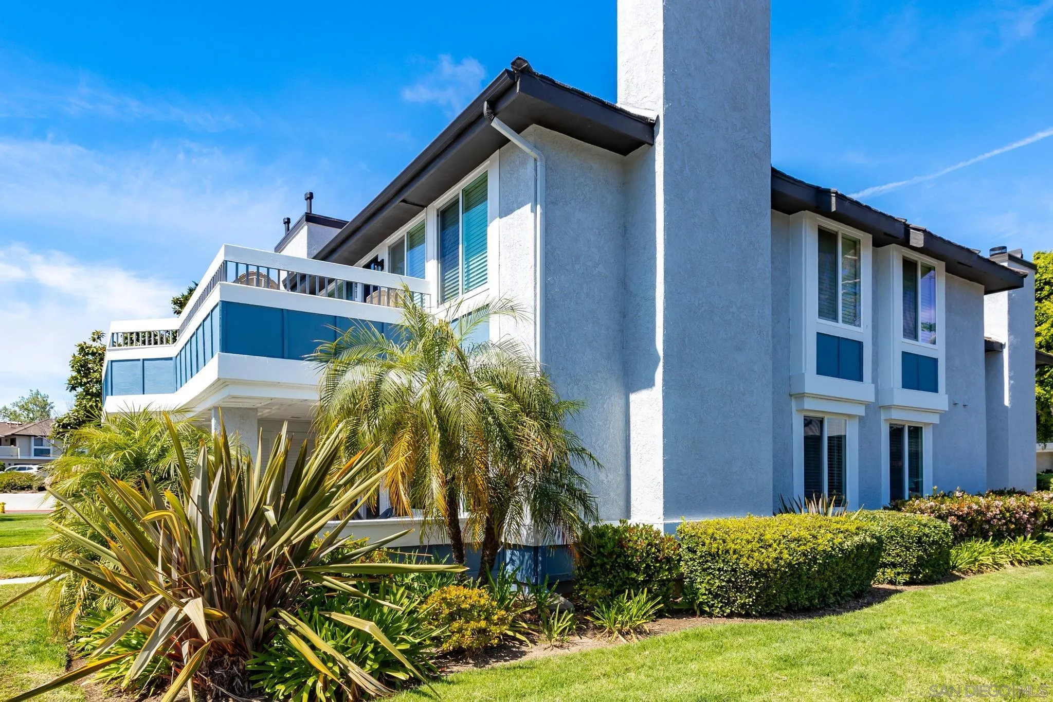 883 Ginger Avenue Carlsbad, CA 92011 - Photo 33 of 33 a front view of a house with a yard
