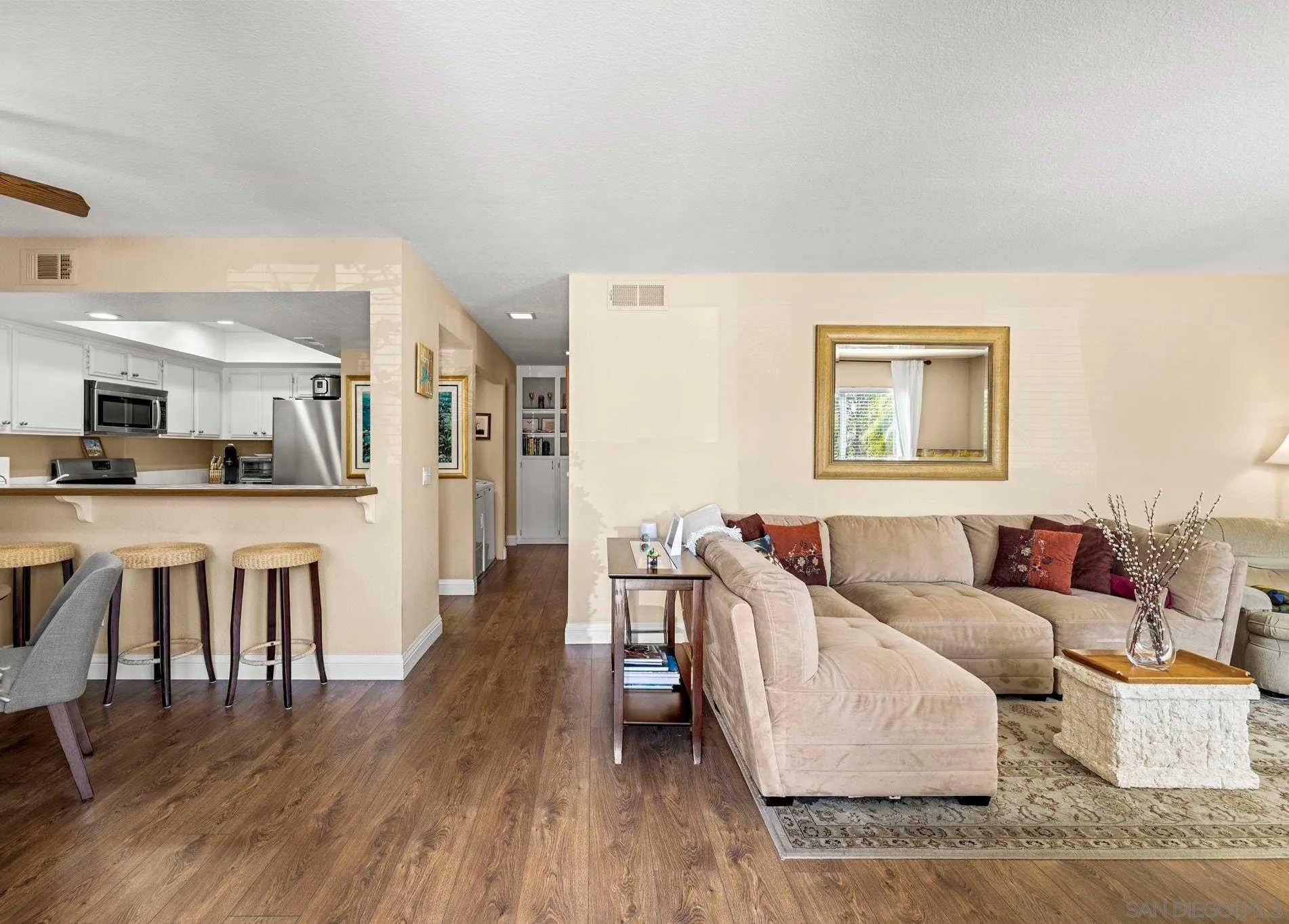 883 Ginger Avenue Carlsbad, CA 92011 - Photo 6 of 33 a living room with furniture and a wooden floor