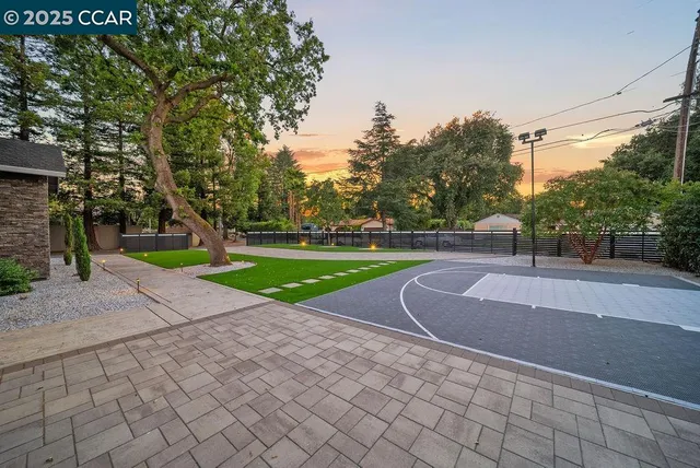 a view of a chairs and table in the garden