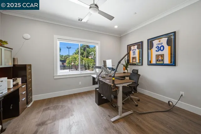 a living room with lots of furniture and a chandelier