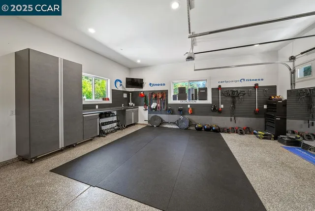 a kitchen with stainless steel appliances a sink and a stove