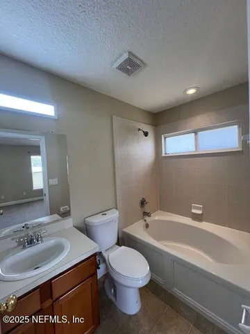 a bathroom with a tub