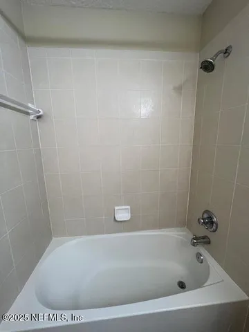 a bathroom with a sink toilet and mirror