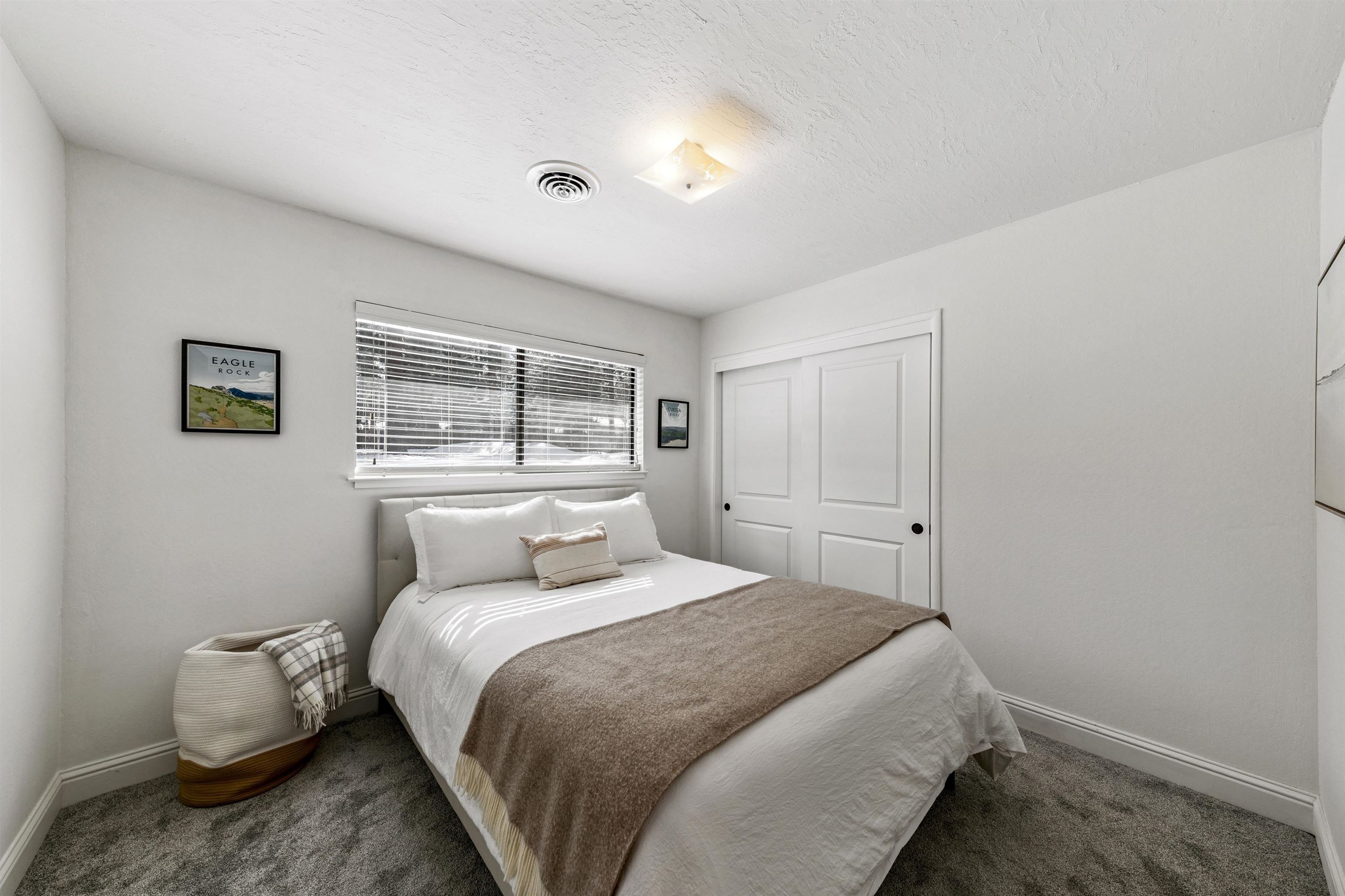 10895 Jeffery Pine Road Truckee, CA 96161 - Photo 20 of 25 a bedroom with a bed and a window