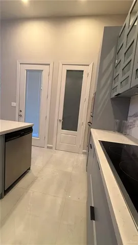 a view of a kitchen cabinets and a sink