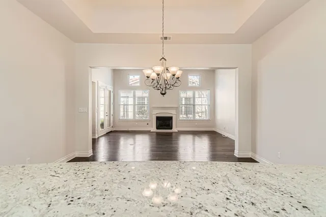 a view of a living room with a chandelier