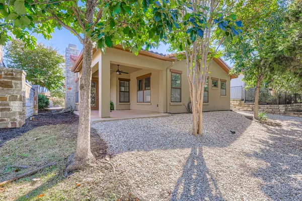 a house with trees in front of it