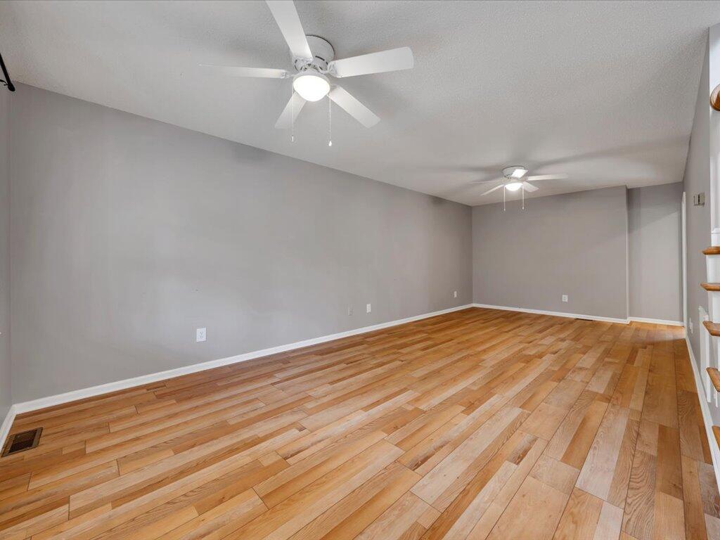 520 Scenic Drive Stuart, VA 24171 - Photo 11 of 83 a view of empty room with wooden floor