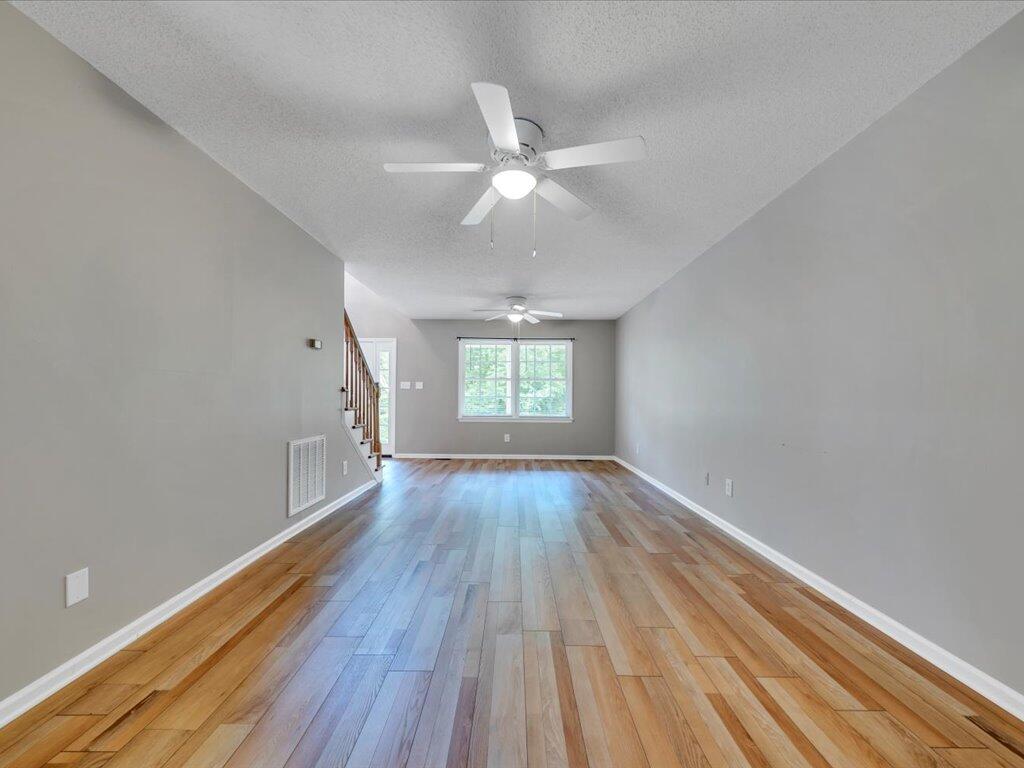 520 Scenic Drive Stuart, VA 24171 - Photo 15 of 83 wooden floor in an empty room with a window