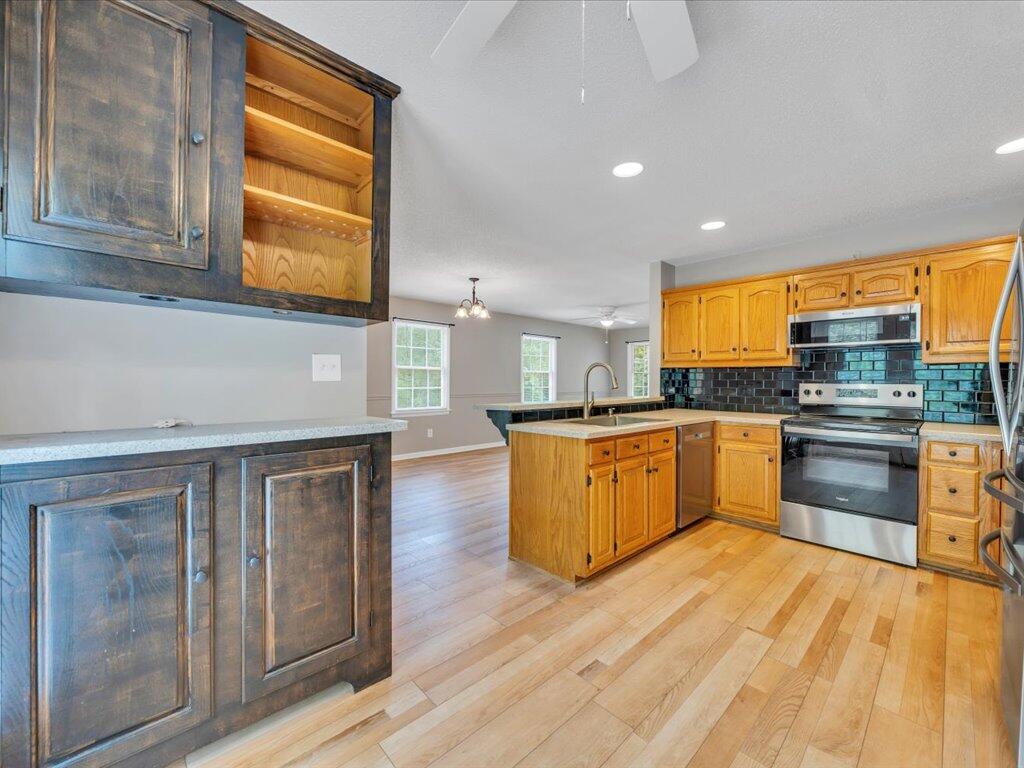 520 Scenic Drive Stuart, VA 24171 - Photo 17 of 83 a kitchen with stainless steel appliances granite countertop a stove a sink and a refrigerator