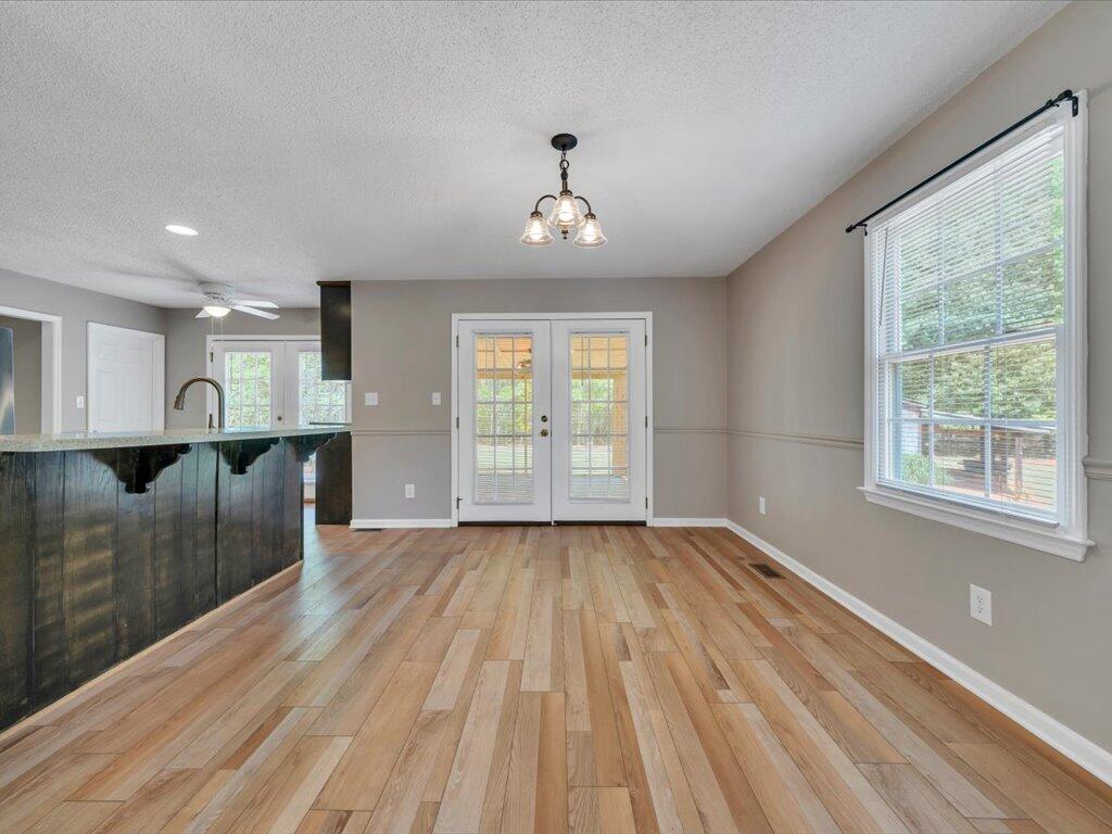 520 Scenic Drive Stuart, VA 24171 - Photo 27 of 83 a view of livingroom with hardwood floor and a ceiling fan