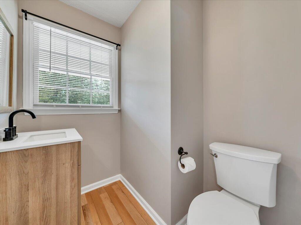 520 Scenic Drive Stuart, VA 24171 - Photo 32 of 83 a bathroom with a toilet a sink and a window