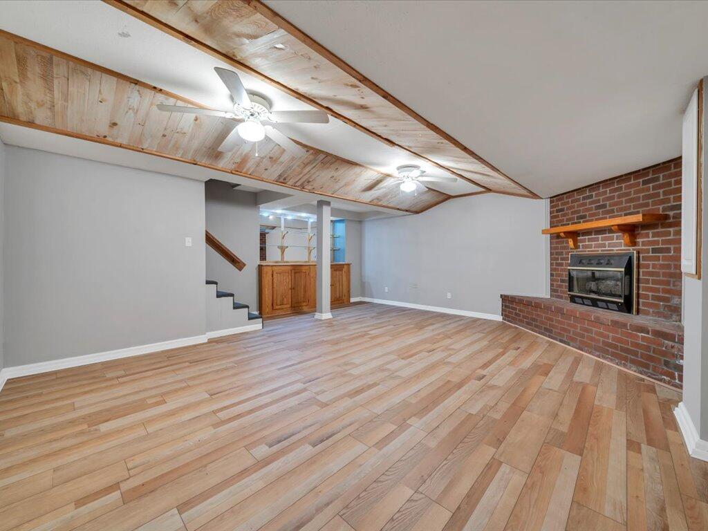 520 Scenic Drive Stuart, VA 24171 - Photo 54 of 83 a room with wooden floor and ceiling fan