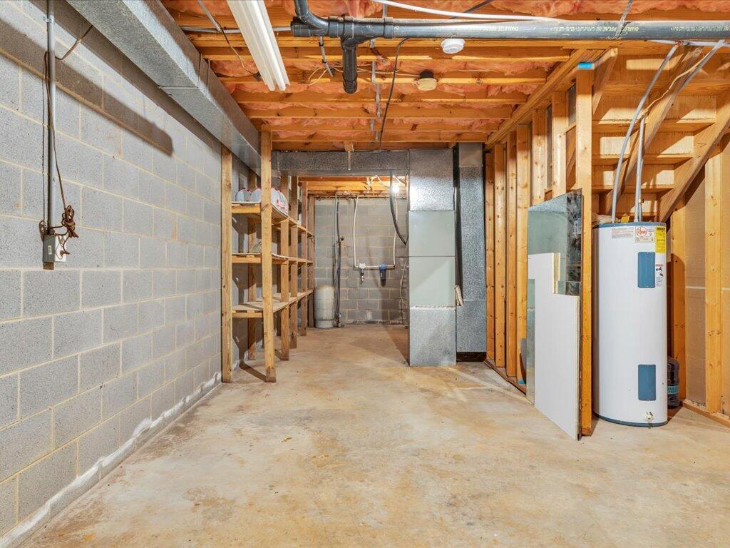 520 Scenic Drive Stuart, VA 24171 - Photo 59 of 83 a view of a big room with wooden walls and stairs