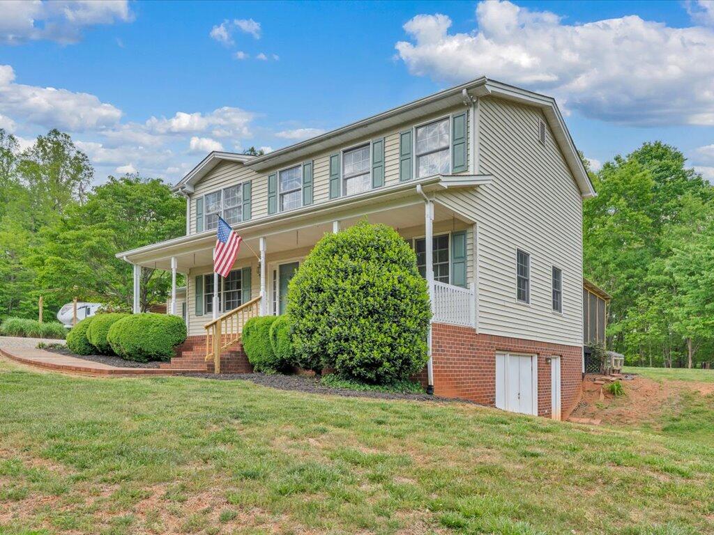 520 Scenic Drive Stuart, VA 24171 - Photo 82 of 83 a front view of a house with garden