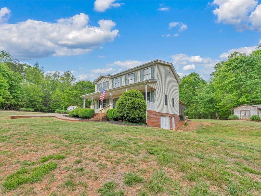 520 Scenic Drive Stuart, VA 24171 - Photo 83 of 83 a front view of a house with a yard