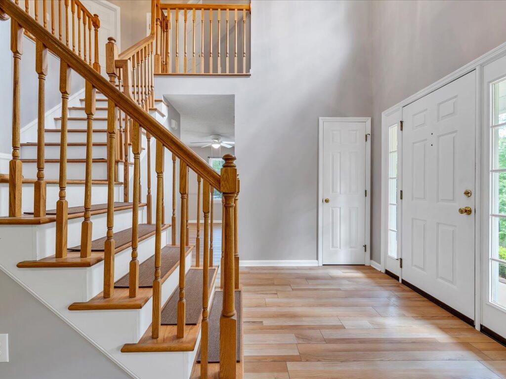 520 Scenic Drive Stuart, VA 24171 - Photo 10 of 83 a view of staircase with lots of frames on wall and a window
