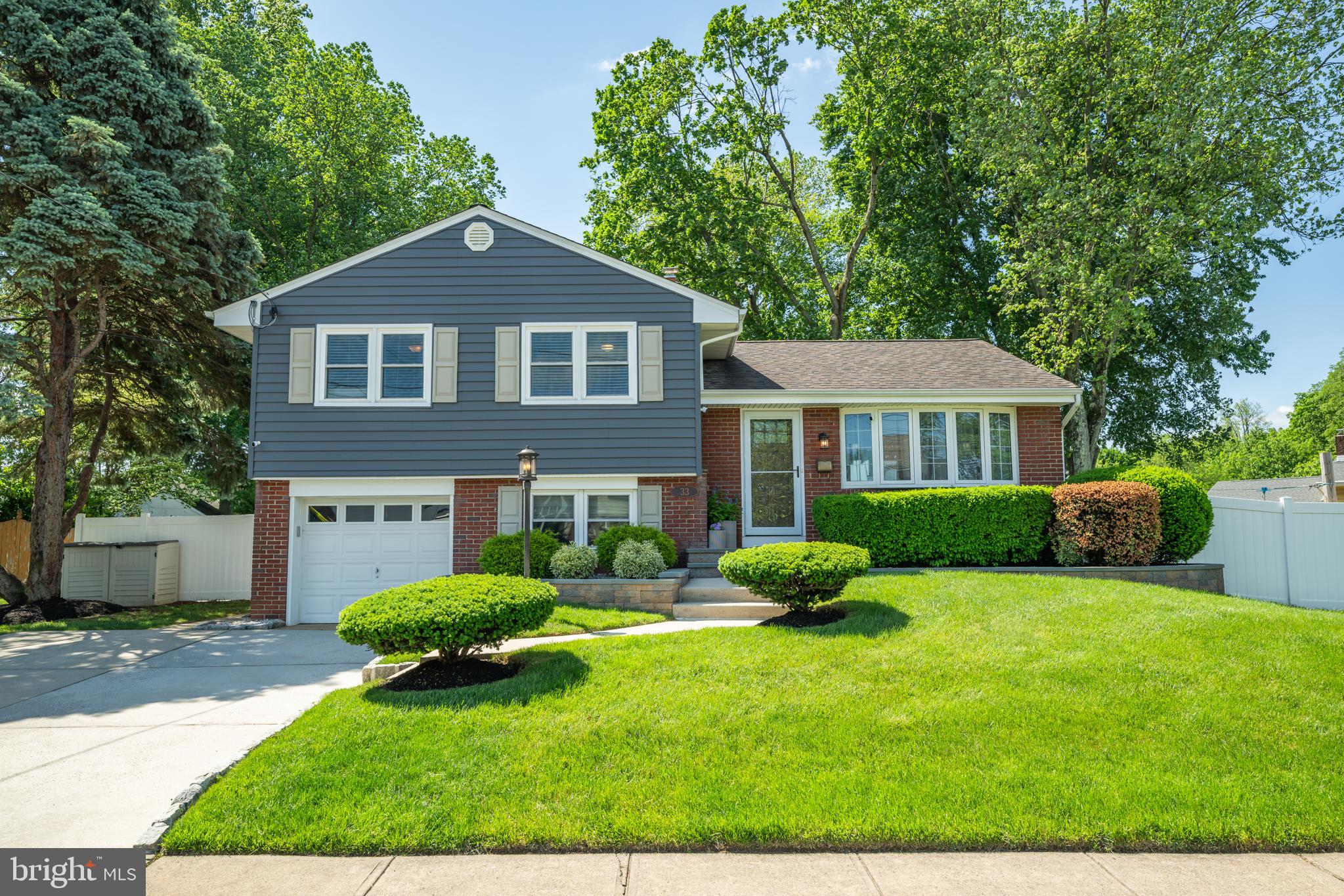 33 Dailey Drive Hamilton, NJ 08620 - Photo 1 of 27 a front view of a house with a yard
