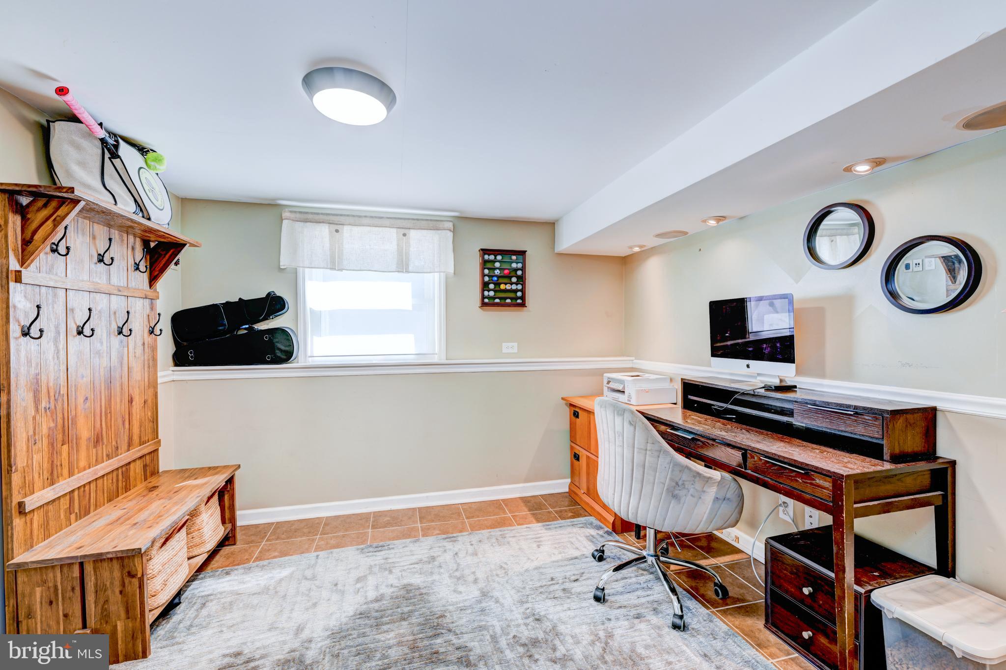 33 Dailey Drive Hamilton, NJ 08620 - Photo 12 of 27 a view of a workspace with furniture and a window