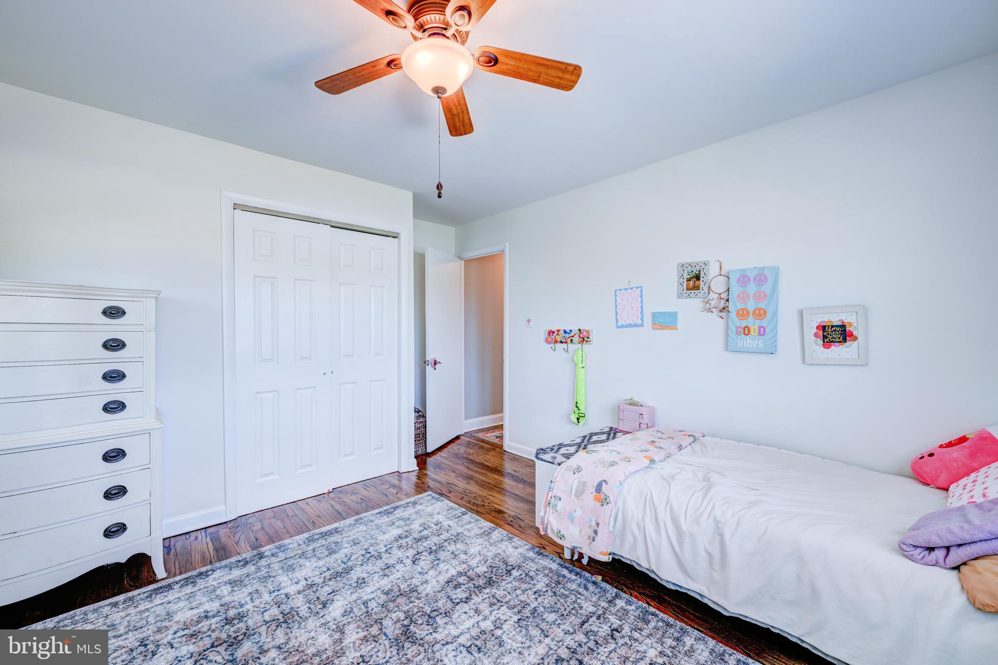 33 Dailey Drive Hamilton, NJ 08620 - Photo 15 of 27 a bedroom with a bed and a chandelier