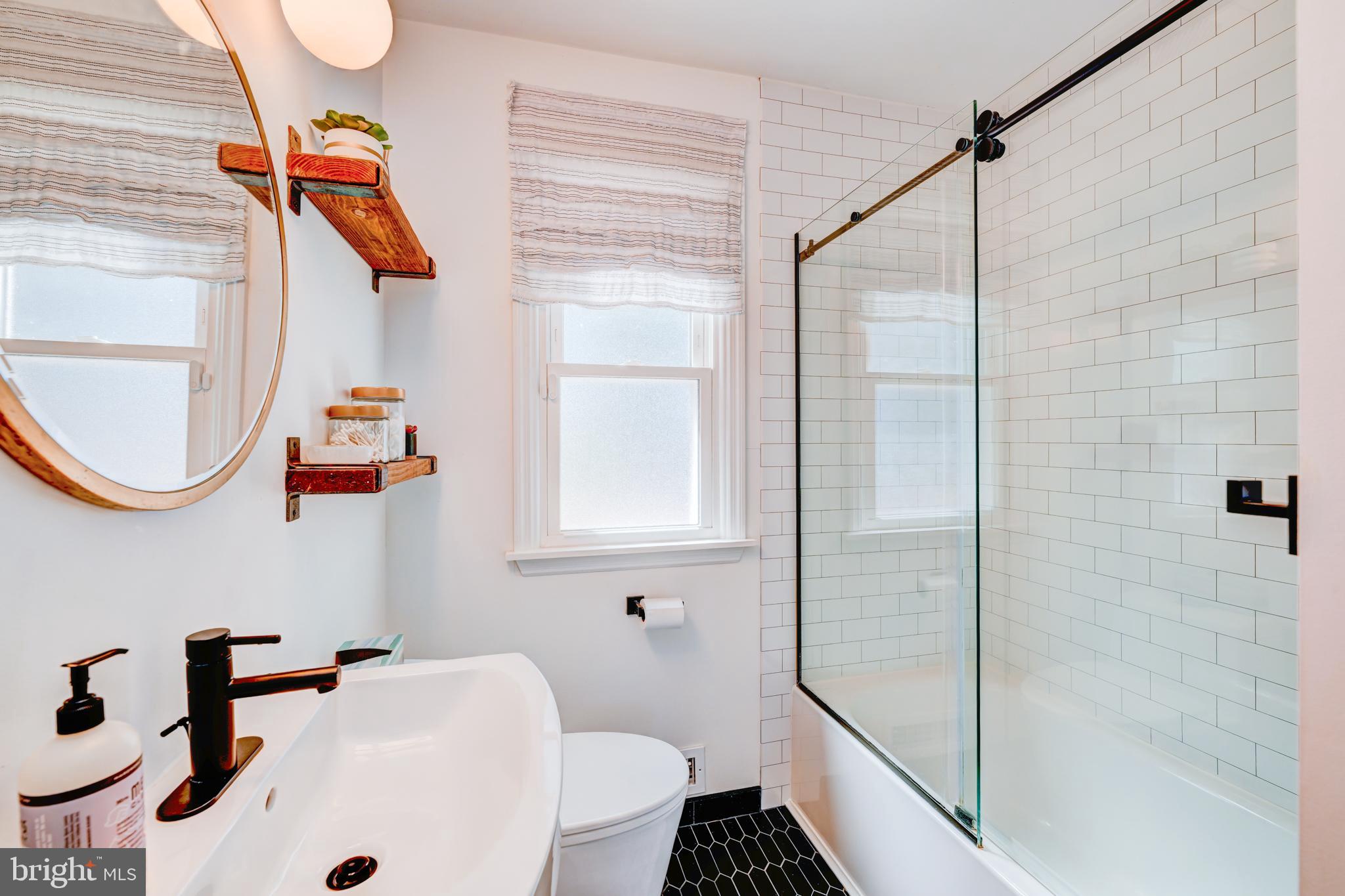 33 Dailey Drive Hamilton, NJ 08620 - Photo 17 of 27 a bathroom with a sink and a shower