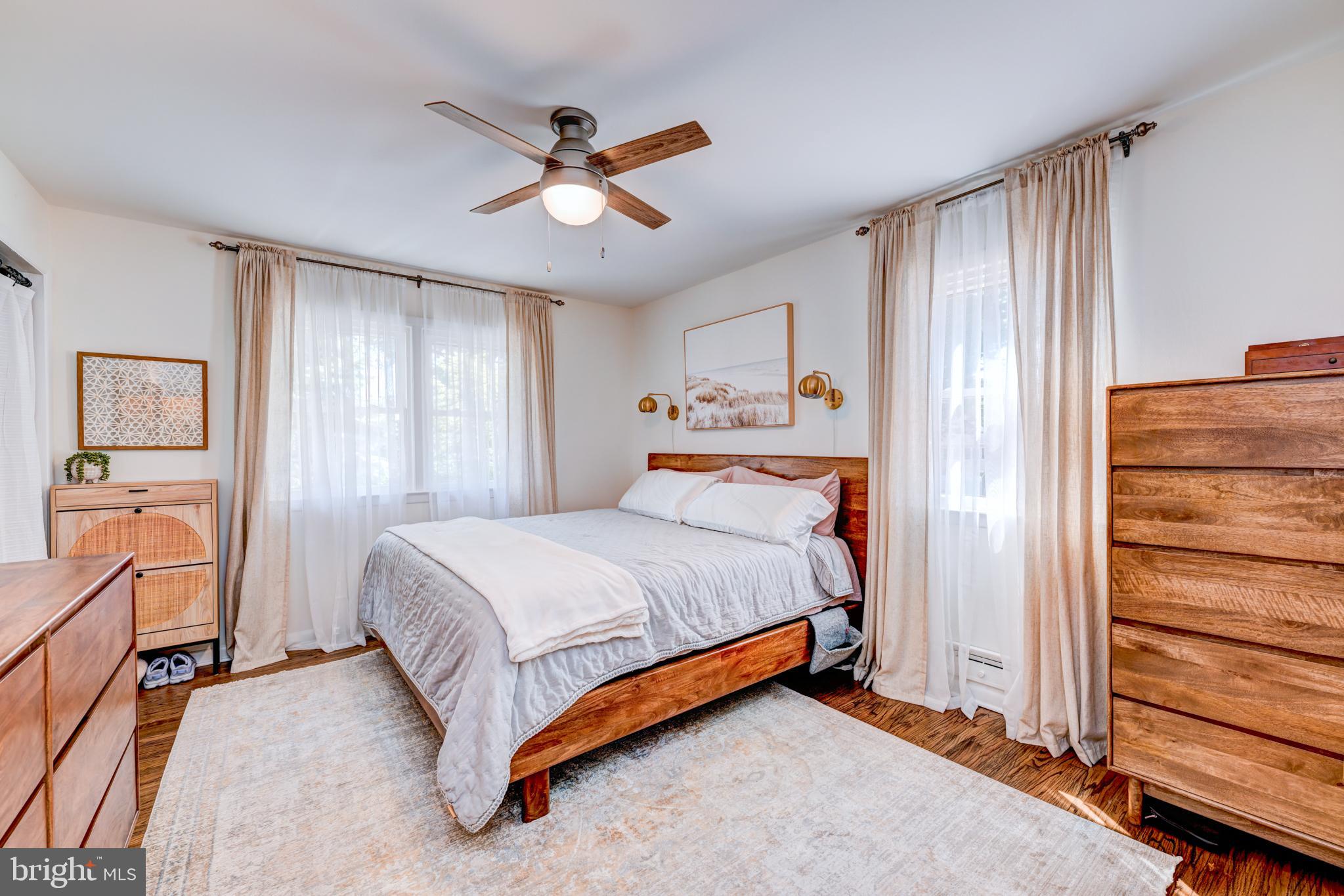 33 Dailey Drive Hamilton, NJ 08620 - Photo 18 of 27 a bedroom with a bed and wooden floor