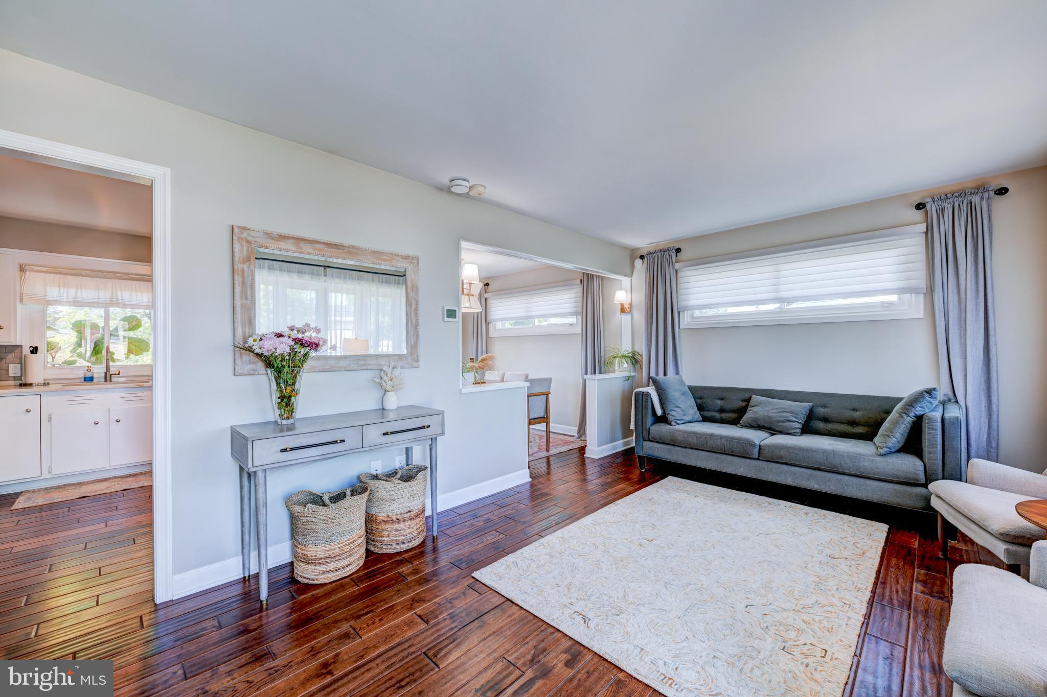 33 Dailey Drive Hamilton, NJ 08620 - Photo 2 of 27 a living room with furniture and a wooden floor