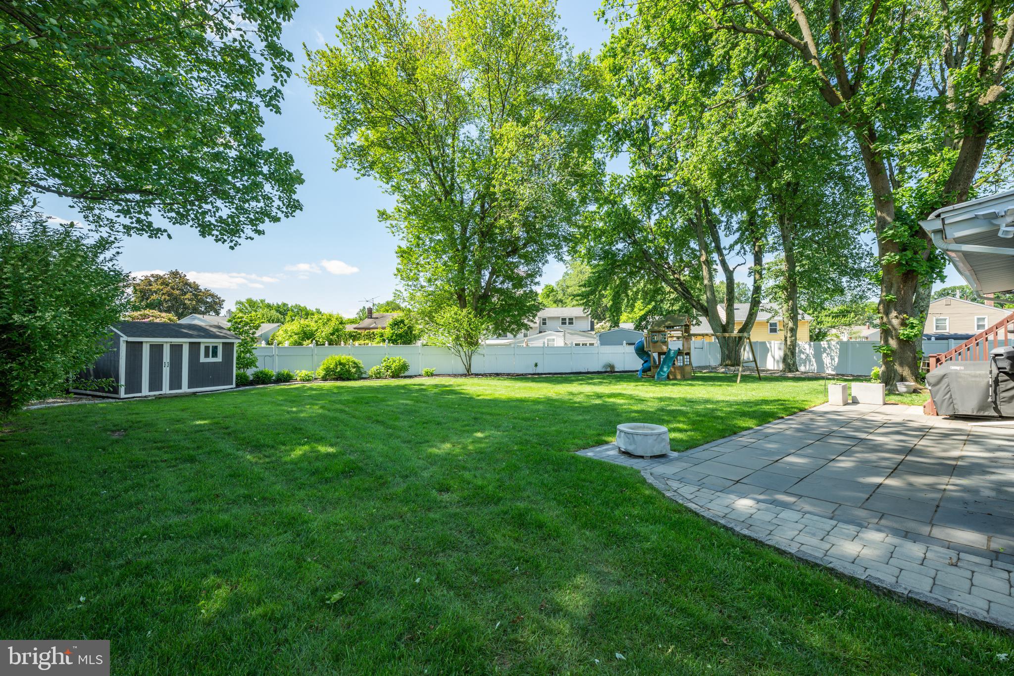 33 Dailey Drive Hamilton, NJ 08620 - Photo 24 of 27 a view of a yard with plants and trees