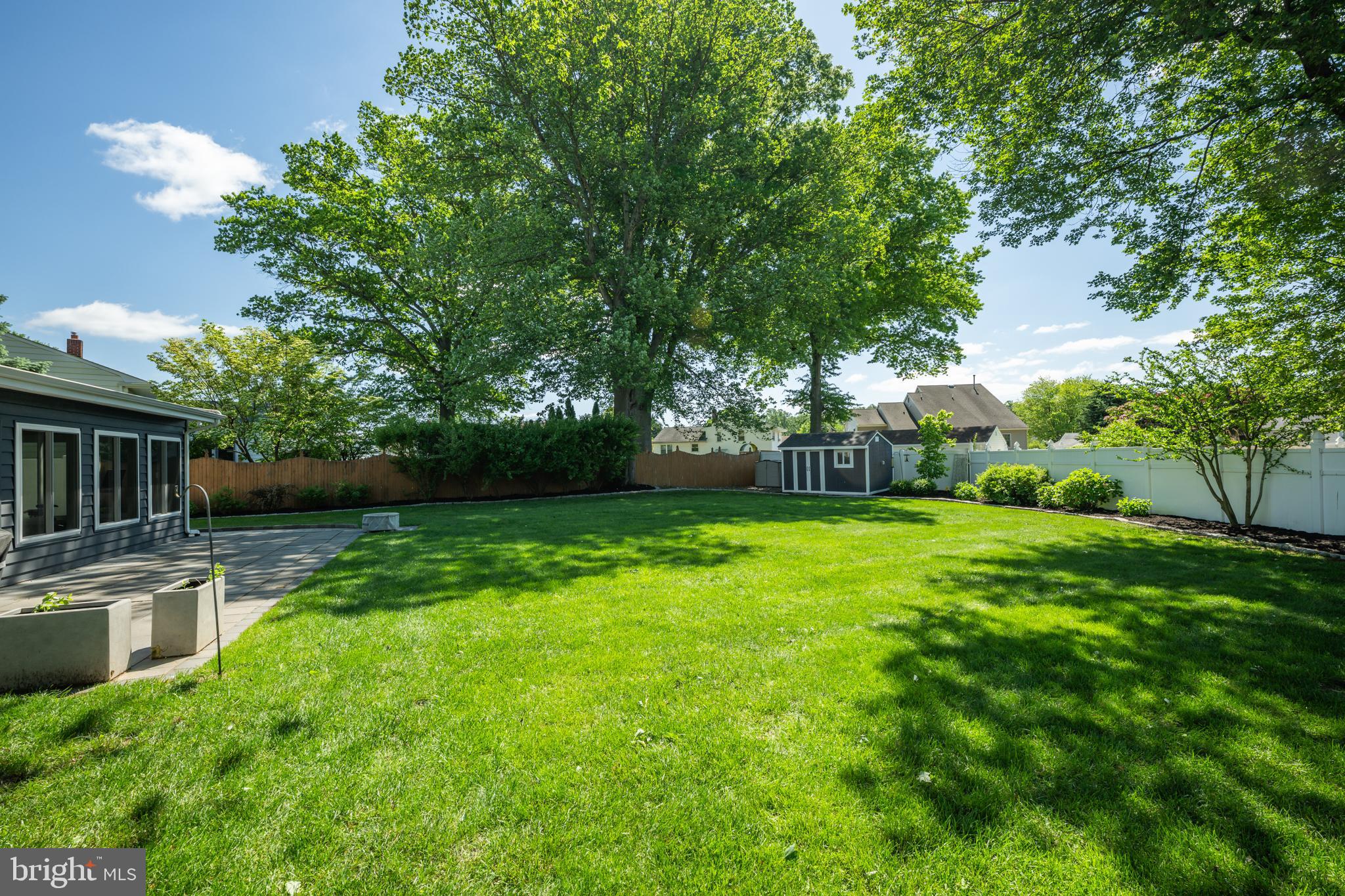 33 Dailey Drive Hamilton, NJ 08620 - Photo 25 of 27 a view of backyard with swimming pool and green space