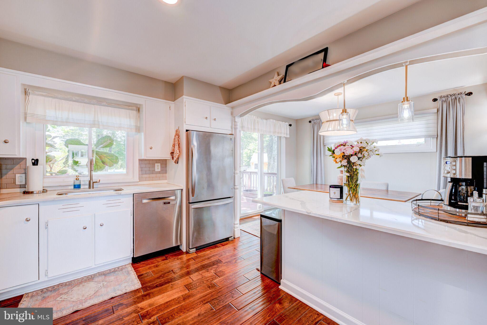 33 Dailey Drive Hamilton, NJ 08620 - Photo 5 of 27 a kitchen with refrigerator cabinets and furniture