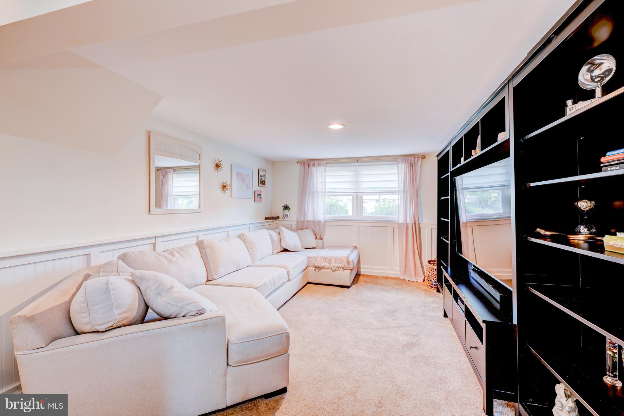 33 Dailey Drive Hamilton, NJ 08620 - Photo 10 of 27 a living room with furniture and a window