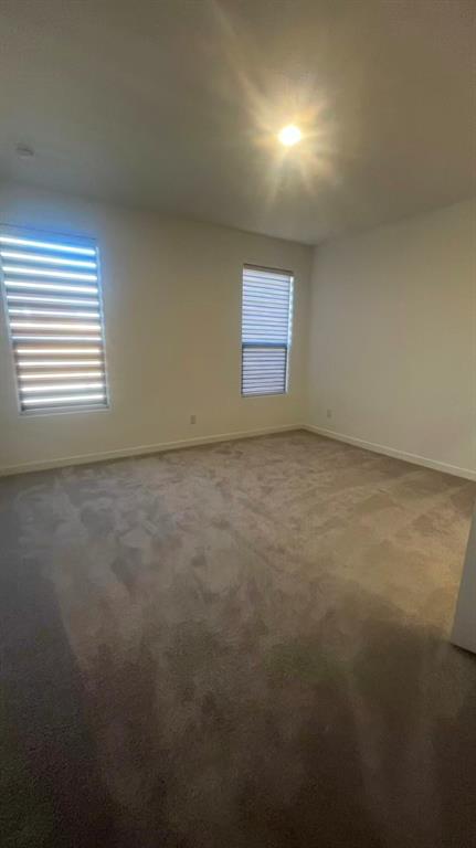 909 Calley Pear Trail Princeton, TX 75407 - Photo 10 of 17 a view of an empty room and a window